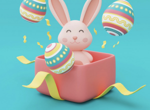 Kolorowy zajączek w pudełku wraz z pisankami.