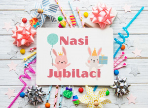 Kolorowy obrazek z motywem urodzinowym i napisem "Nasi Jubilaci"